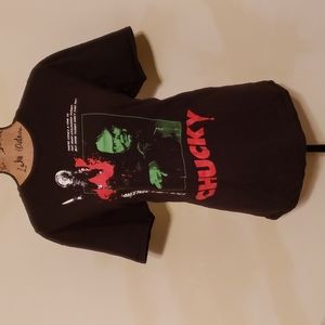 Black Chucky Tee shirt.